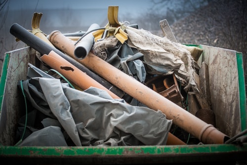 The bed of a junk removal truck full of junk by 5 star